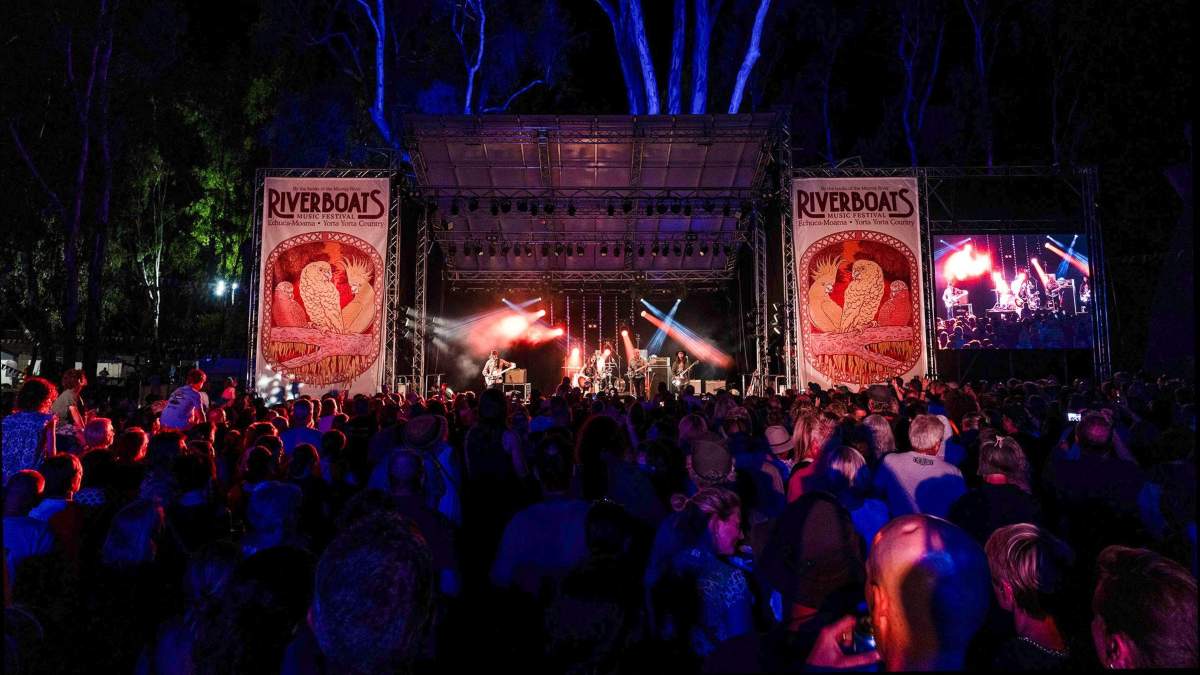 large crowd at night at music festival