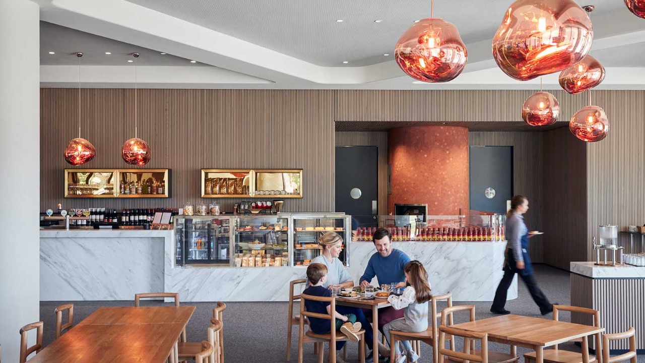 Family dining at a table in RACV's Mantellina restaurant.